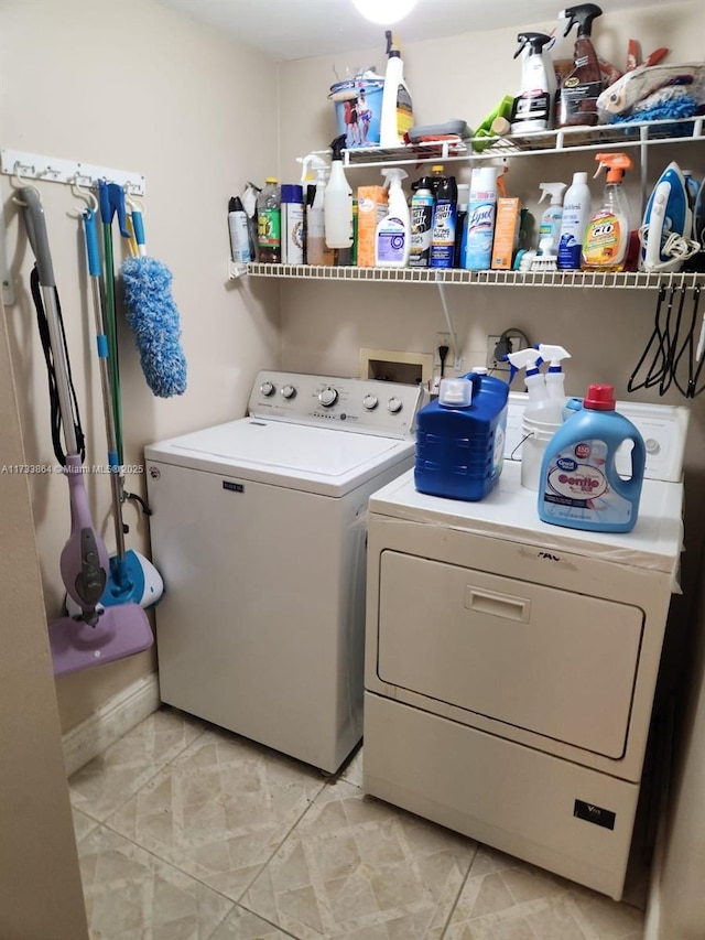 washroom with separate washer and dryer