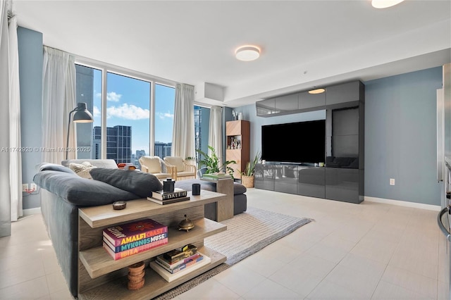 living room featuring a wall of windows