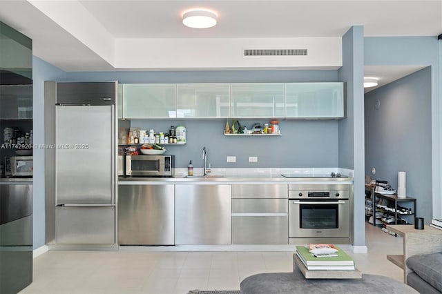 kitchen featuring appliances with stainless steel finishes and sink