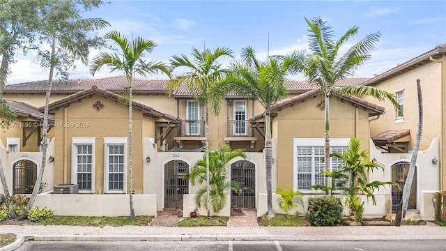 mediterranean / spanish-style house featuring cooling unit