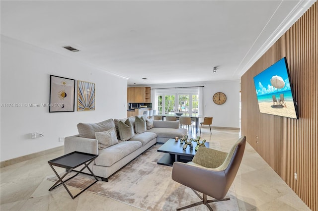 living room featuring wood walls