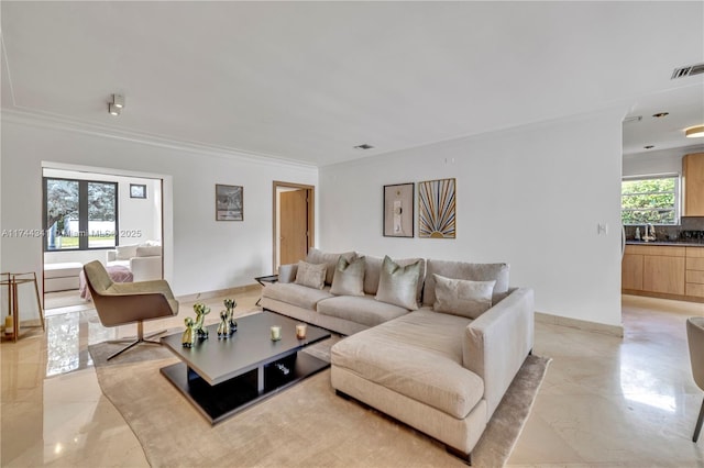 living room with crown molding