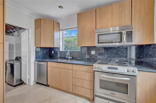 kitchen featuring light brown cabinetry, sink, dark stone countertops, ornamental molding, and stainless steel appliances