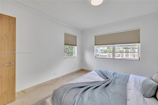 bedroom with crown molding