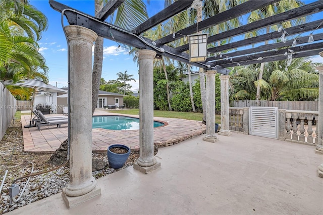 view of pool with a pergola and a patio area