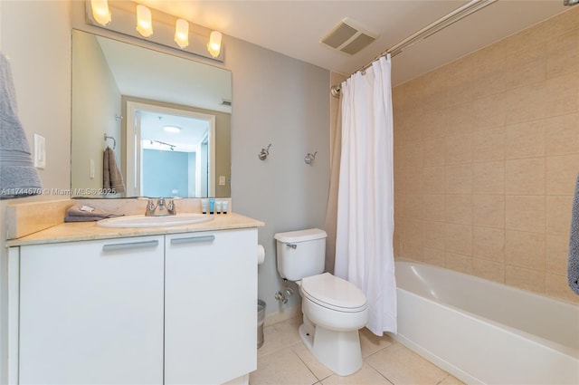 full bathroom featuring shower / bath combination with curtain, vanity, tile patterned floors, and toilet