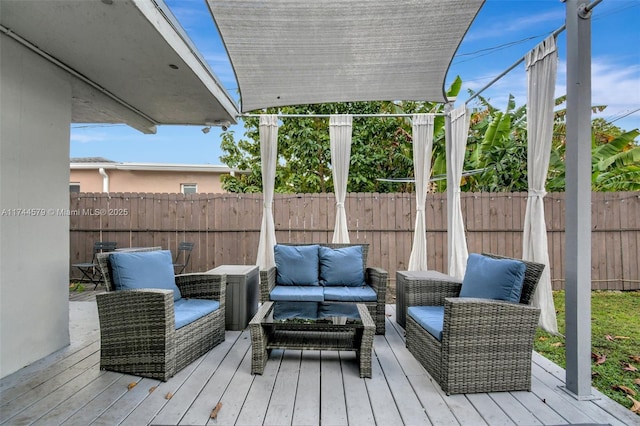 deck featuring an outdoor living space