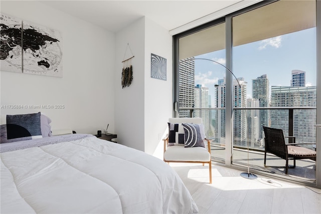 bedroom featuring expansive windows