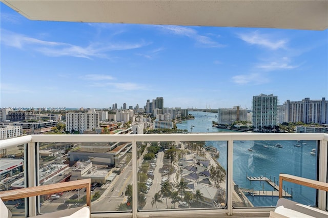 balcony featuring a water view