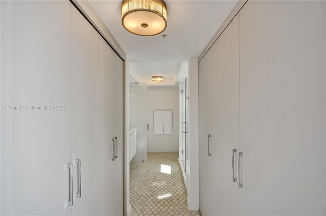 hallway featuring tile patterned floors