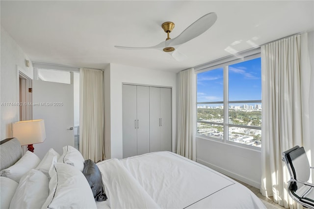 bedroom with a closet and ceiling fan