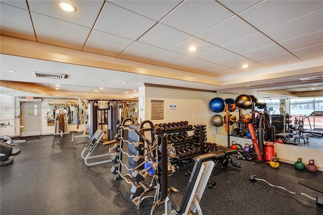 workout area with a drop ceiling