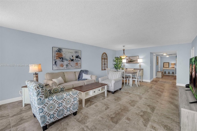 living room featuring a textured ceiling