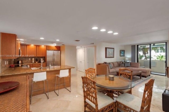 dining room featuring sink