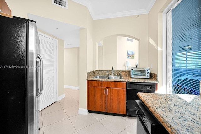 kitchen featuring dishwasher, sink, crown molding, light stone counters, and stainless steel refrigerator with ice dispenser