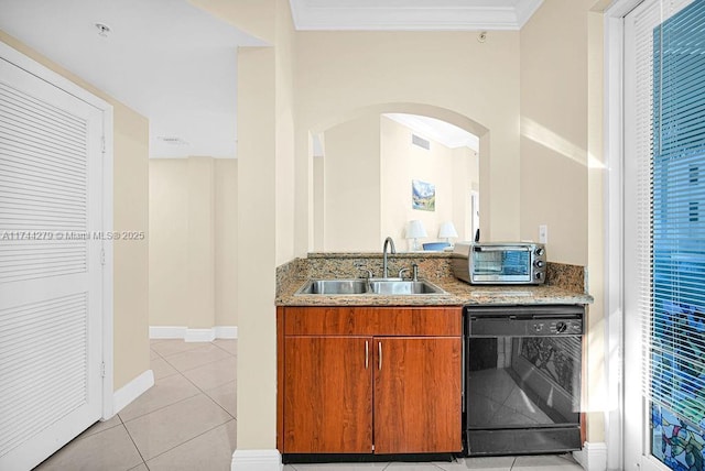 kitchen featuring sink, stone countertops, light tile patterned floors, ornamental molding, and dishwasher