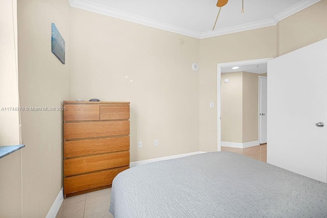 tiled bedroom featuring ceiling fan and ornamental molding