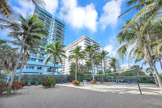 view of property's community featuring volleyball court