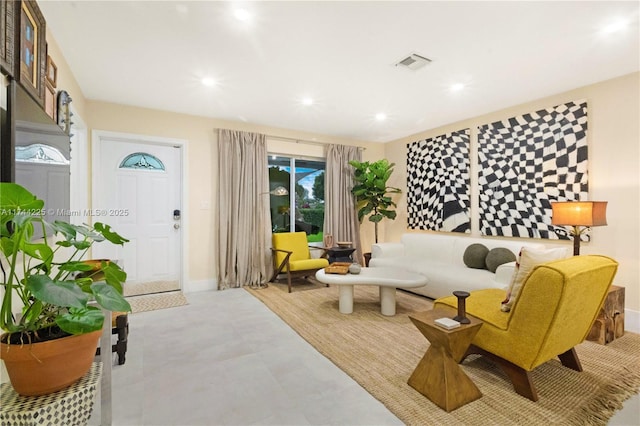 interior space with recessed lighting, visible vents, and baseboards