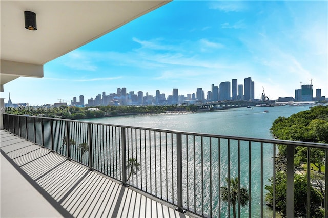 balcony with a city view and a water view