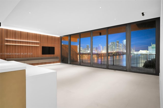 unfurnished living room featuring expansive windows