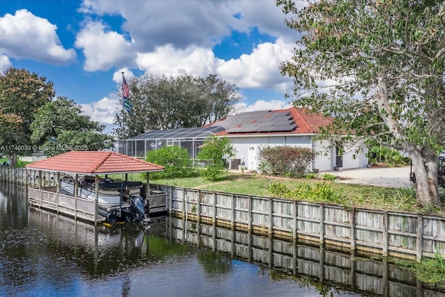 view of dock with a water view and boat lift