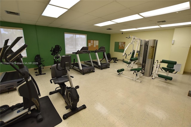 gym with a drop ceiling