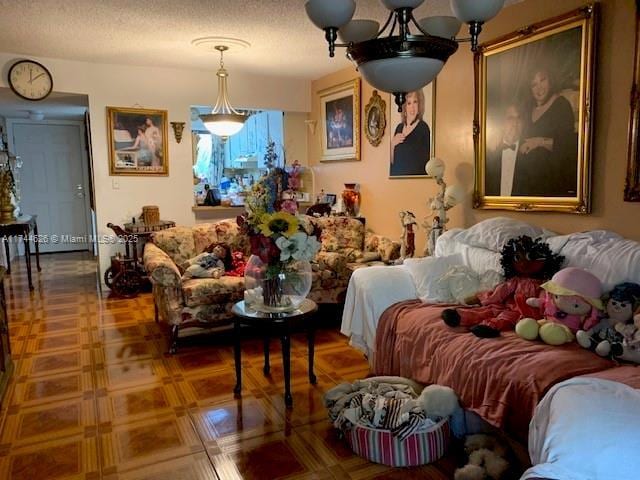 living room with a textured ceiling