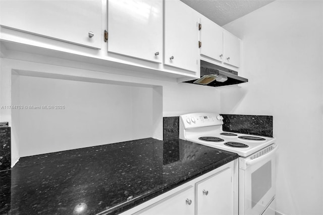 kitchen with a textured ceiling, under cabinet range hood, electric range, white cabinetry, and dark stone countertops