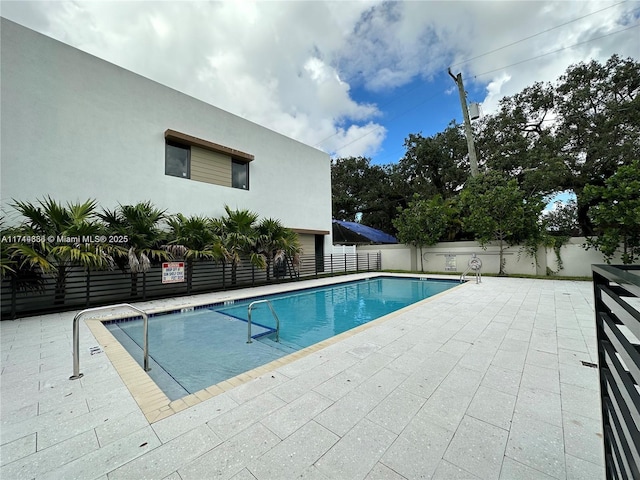 view of pool with a patio area