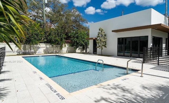 view of pool with a patio area