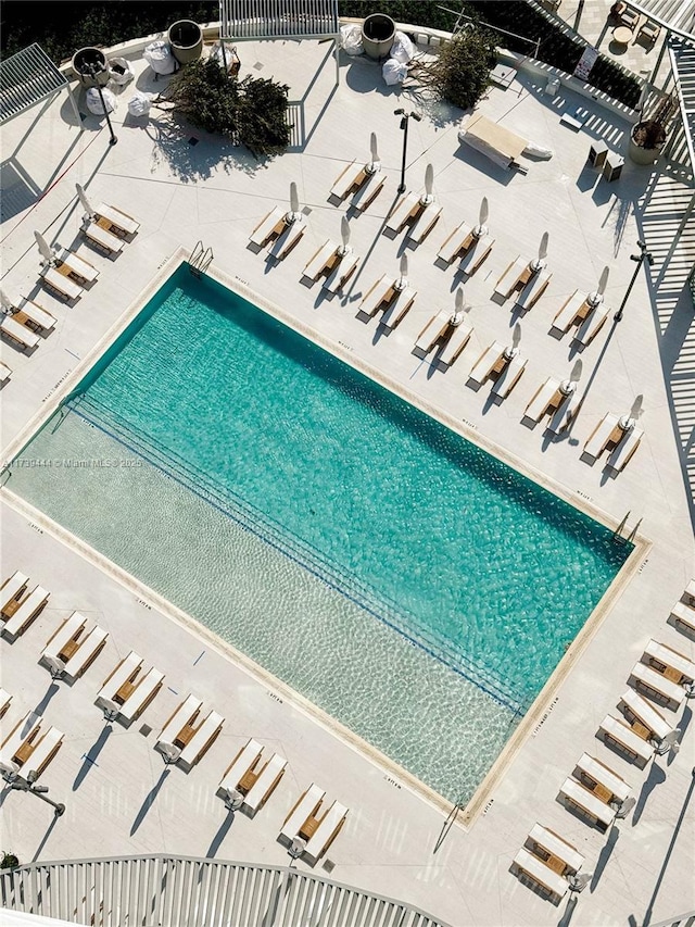 view of swimming pool featuring a patio