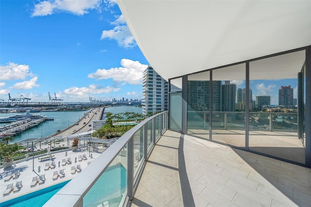 balcony featuring a water view