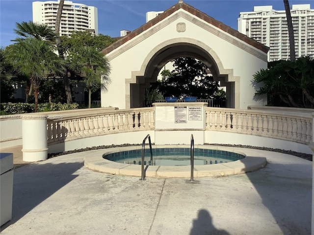 view of pool featuring a community hot tub