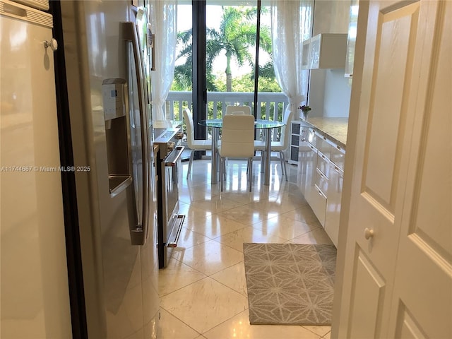 interior space with light tile patterned floors