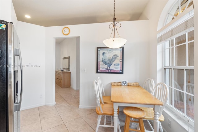 dining room featuring light tile patterned flooring