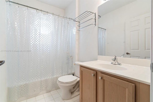 full bathroom with tile patterned floors, toilet, shower / tub combo, and vanity