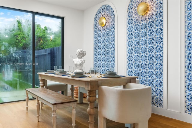 dining room featuring wood-type flooring