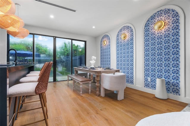 dining room featuring light hardwood / wood-style flooring