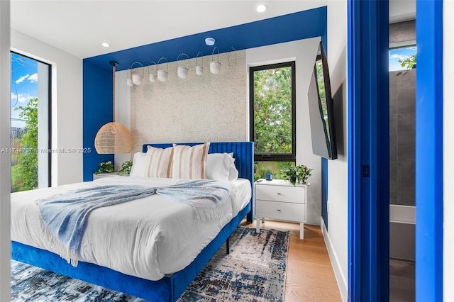 bedroom with wood-type flooring