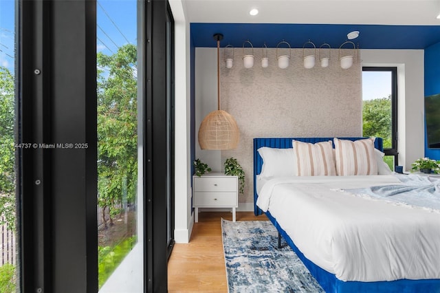 bedroom featuring light hardwood / wood-style floors