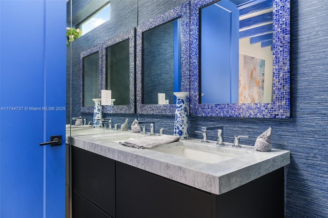 bathroom with vanity and backsplash