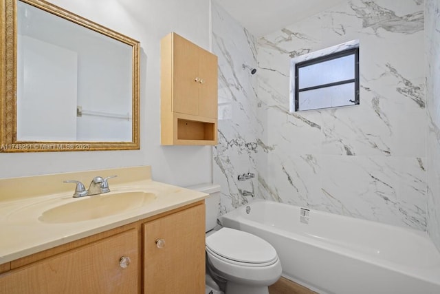 full bathroom featuring vanity, toilet, and tiled shower / bath combo