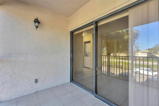 doorway to property with a balcony