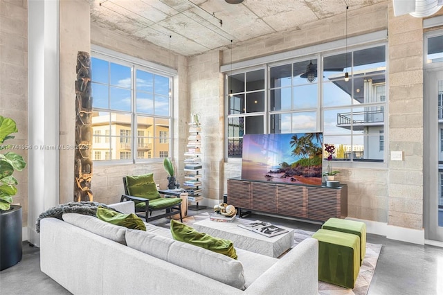 living room with concrete floors