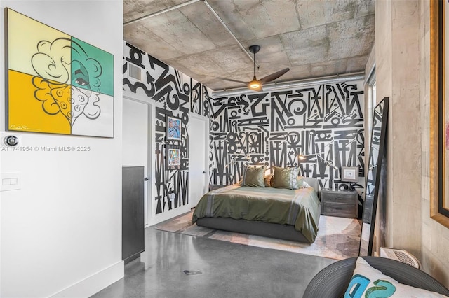 bedroom featuring concrete flooring