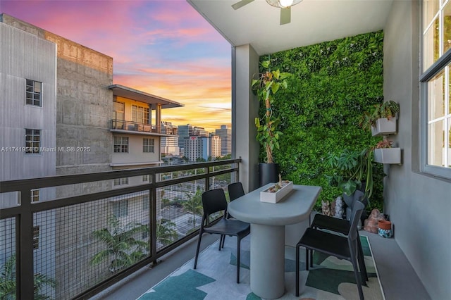 balcony at dusk with ceiling fan