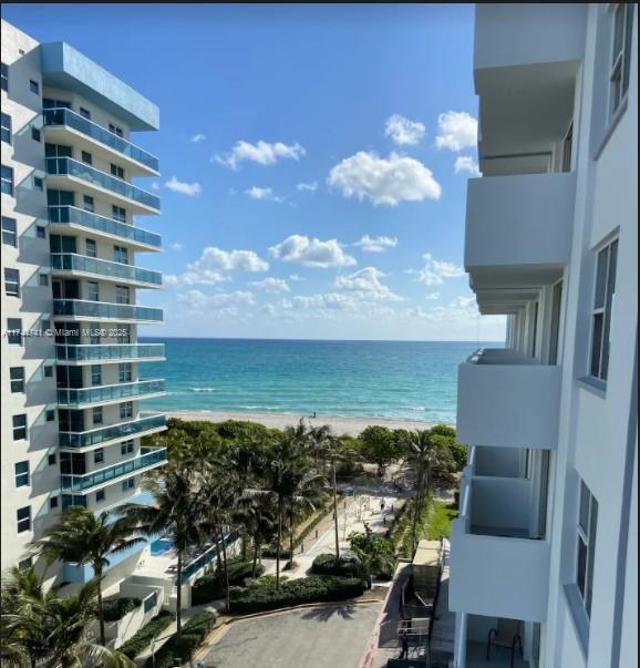 property view of water featuring a view of the beach