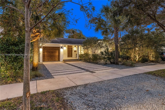 view of front of home with a garage