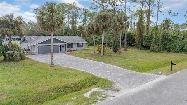 view of front facade featuring a garage and a front lawn